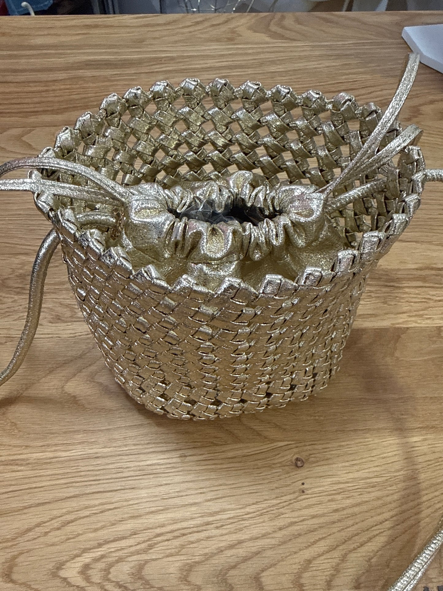Gold cage bag